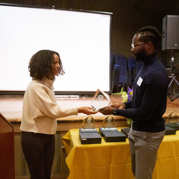 Photo at 2022 awards ceremony. Student accepting award.