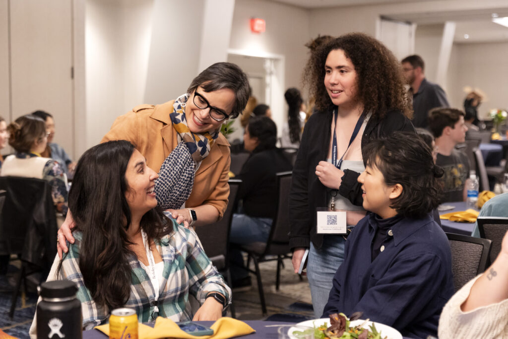 Lisa Garcia Bedolla speaks with prospective students during diversity days