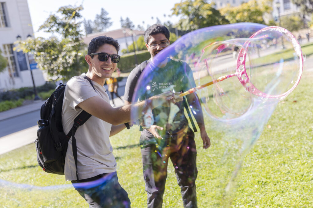 students playing with bubbles