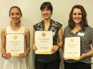 The Berkeley Grad Slam winners. Kelly Swanson, Physics, first place and Peoples Choice; Joan Dudney, ESPM, in 2nd Place; and Stephanie Mack, Physics, in 3rd Place.