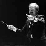 person conducting orchestra