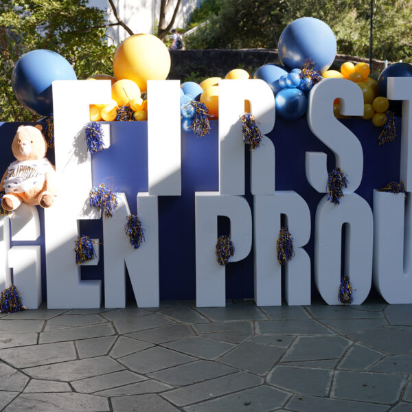 First Gen Proud sign with balloons