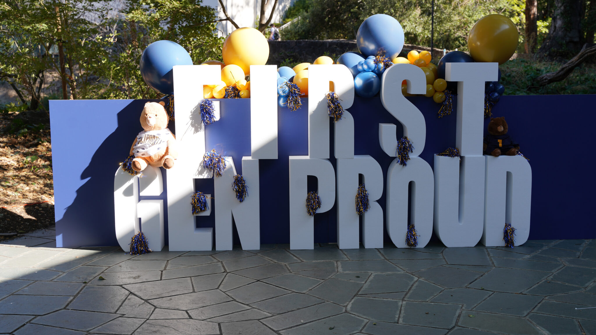 First Gen Proud sign with balloons