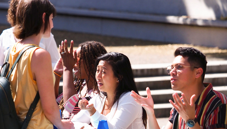 Students conversing at GradFest
