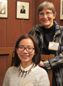 Associate Dean Susan Muller places Una's necklace on this year's recipient, Yu-Hui (Amy) Lin.