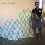Sofie Ramos next to artwork