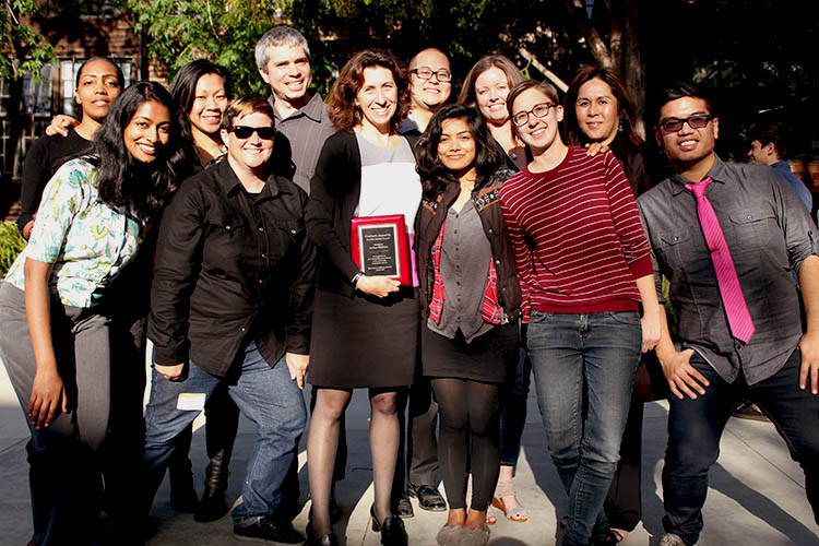 article about faculty mentorship. Students posing with mentors.