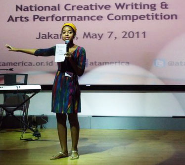 Paige Johnson gives opening remarks at the National Creative Writing and Arts Competition for high schoolers in Jakarta, Indonesia, in 2011.