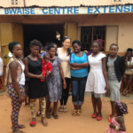 Photo of Iris Lin with Ghanians in Ghana