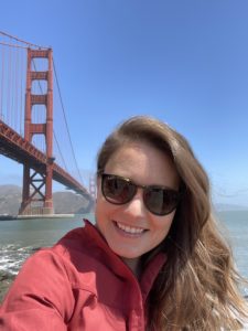 Photo of Valeri Vasquez in front of the Golden Gate Bridge