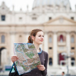 Photo of a woman holding a map