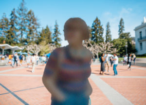 blurred picture of person on Sproul Plaza