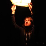 Kurtis Heimerl holding a lamp