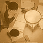 Image of students studying at a library
