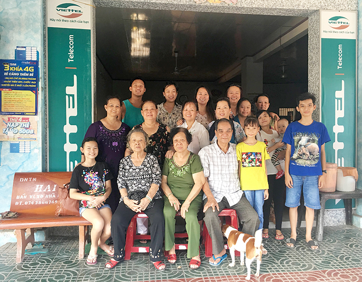 Iris Lin posing with relatives in Vietnam